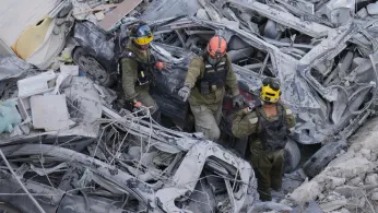 The Latest: Death toll grows as Israel and Iran trade attacks for third day