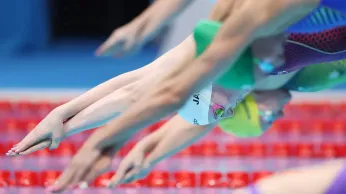 Trans Swimmer Anne Isabella Coombes Stages Topless Protest Against Gender Policy at UK Meet