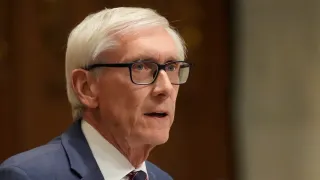 Governor signs budget in early morning to secure Medicaid funds